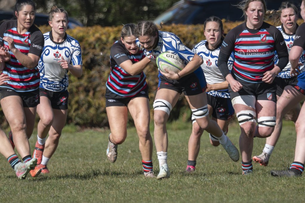 The Westshore Valkyries attacking in a line with the ball carrier out front, against Castaway Wanderers, February 2026.